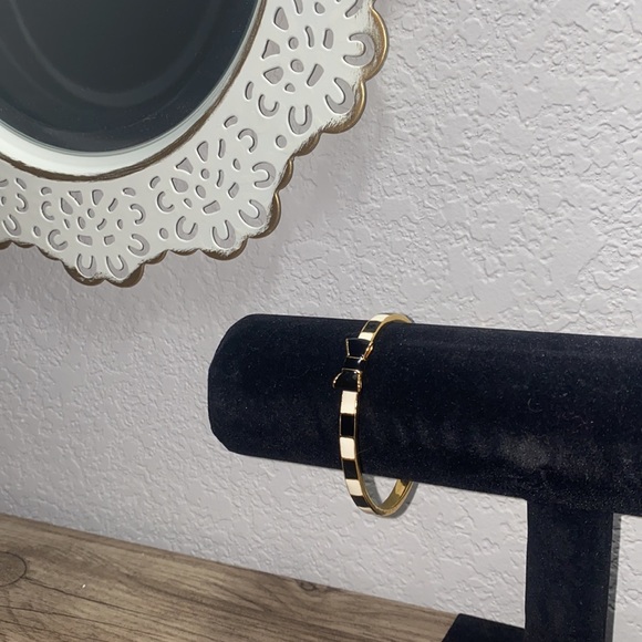 kate spade Jewelry - Kate Spade Black, White & Gold Bow Bracelet